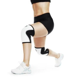 Rehband RX Knee Sleeve - 5mm - White/Black -Fitness Supplies Store 105301 01 Rehband Rx Knee Sleeve White Black 5mm Lifestyle Shot