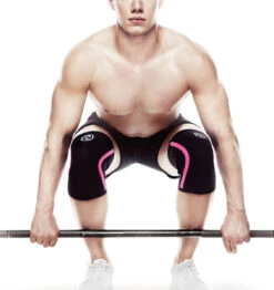 Rehband RX Knee Sleeve - 7mm - Black/Pink -Fitness Supplies Store 105434 Rehband Rx Knee Sleeve Black Pink 7mm Lifestyle Shot