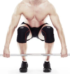 Rehband RX Knee Sleeve - 7mm - Black/Red -Fitness Supplies Store 105436 02 Rehband Rx Knee Sleeve Black Red 7mm Lifestyle Shot