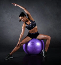 PTP Core Ball - 55cm - Pearl Violet -Fitness Supplies Store PTP Core Ball 55cm Pearl Violet Action Shot