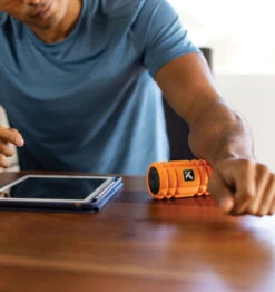 TriggerPoint NANO VIBE Vibrating Foam Roller - 7.5" - Orange 33 TriggerPoint NANO VIBE Vibrating Foam Roller - 7.5" - Orange -Fitness Supplies Store TriggerPoint Nano Vibe Vibrating Foam Roller Lifestyle 04