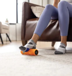 TriggerPoint NANO VIBE Vibrating Foam Roller - 7.5" - Orange 37 TriggerPoint NANO VIBE Vibrating Foam Roller - 7.5" - Orange -Fitness Supplies Store TriggerPoint Nano Vibe Vibrating Foam Roller Lifestyle 08