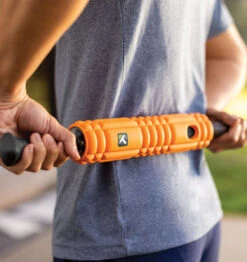 TriggerPoint STK VIBE Vibrating Massage Stick - 20" - Orange 31 TriggerPoint STK VIBE Vibrating Massage Stick - 20" - Orange -Fitness Supplies Store TriggerPoint STK Vibe Vibrating Massage Stick Lifestyle 07
