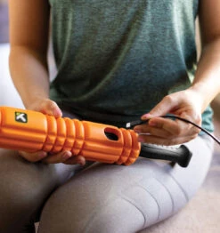 TriggerPoint STK VIBE Vibrating Massage Stick - 20" - Orange 32 TriggerPoint STK VIBE Vibrating Massage Stick - 20" - Orange -Fitness Supplies Store TriggerPoint STK Vibe Vibrating Massage Stick Lifestyle 08