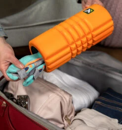 TriggerPoint Travel GRID Foam Roller - 10" - Orange 24 TriggerPoint Travel GRID Foam Roller - 10" - Orange -Fitness Supplies Store TriggerPoint Travel Grid Foam Roller Orange Lifestyle 02