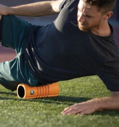 TriggerPoint Travel GRID Foam Roller - 10" - Orange 26 TriggerPoint Travel GRID Foam Roller - 10" - Orange -Fitness Supplies Store TriggerPoint Travel Grid Foam Roller Orange Lifestyle 04